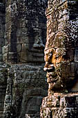 Angkor Thom - Bayon temple, second enclosure, corner towers seen from the central terrace 